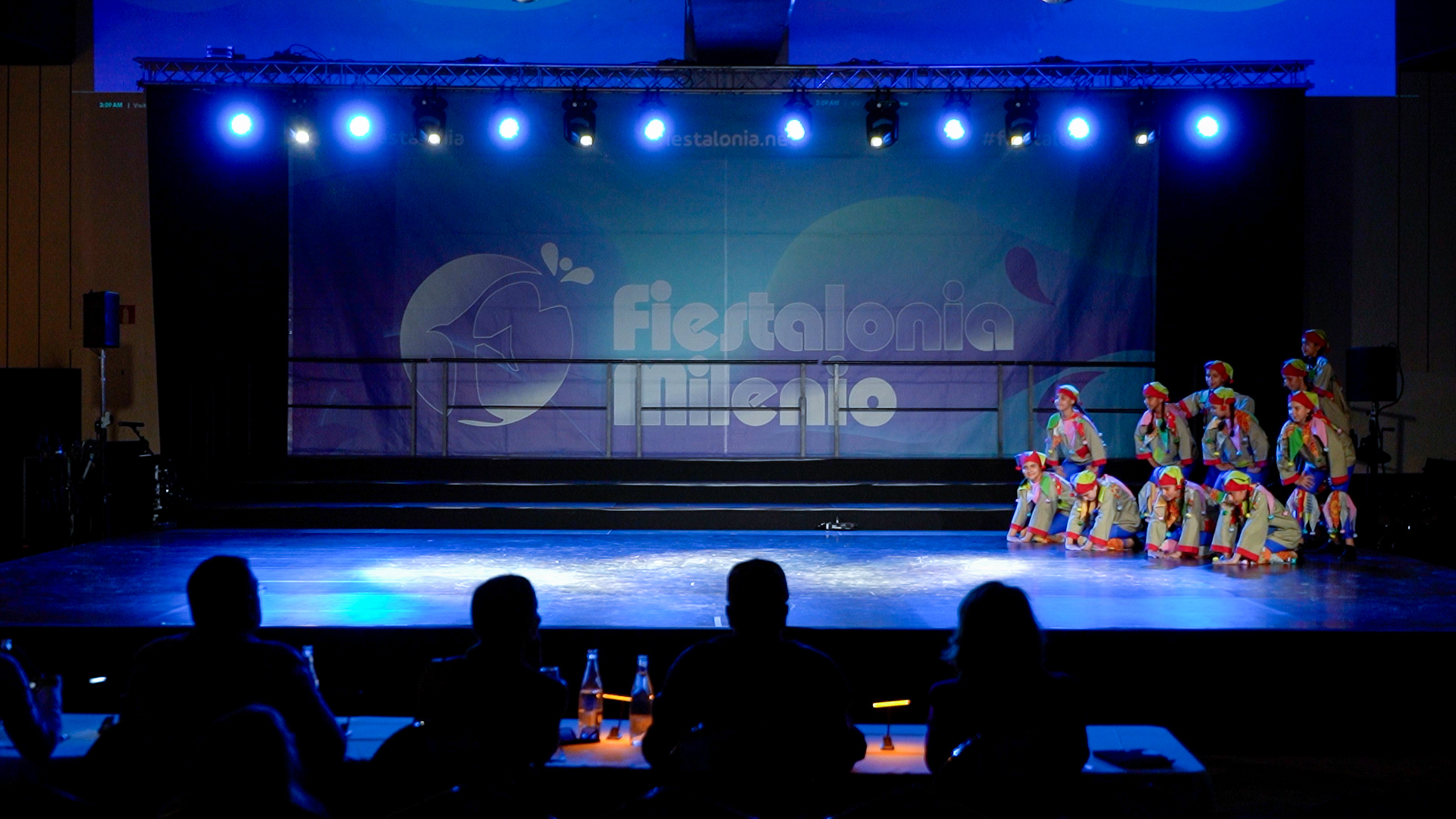 A dance group performing on stage, GVM, DF and SS shared archive, April 2025.