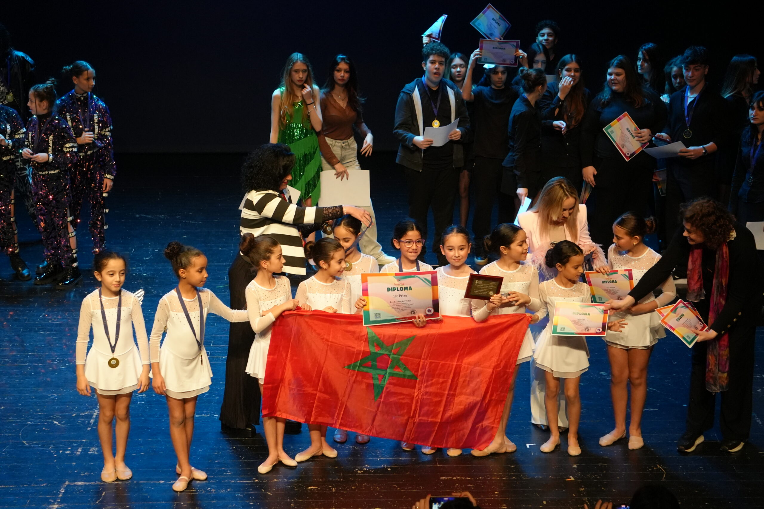 Performers with diplomas at the Super Cup awards ceremony, archive 2026.