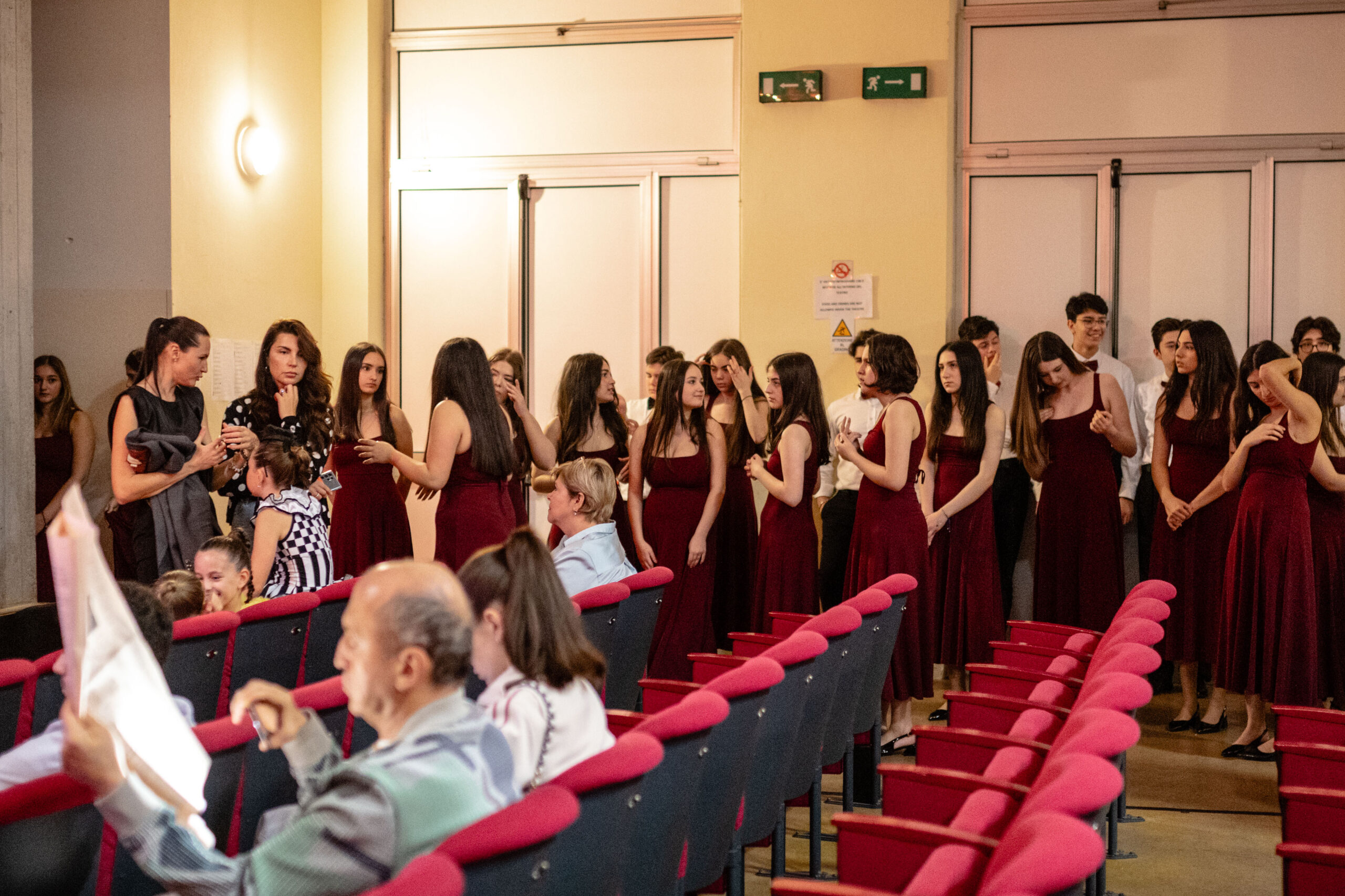 Choir singers preparing for a performance at World of Choirs, archive 2025. Photo: Mattia Celli.